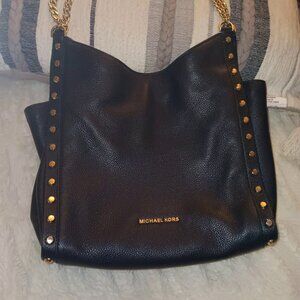 BEAUTIFUL...  MICHAEL KORS BAG ,pebble leather.  BLACK WITH GOLD DECORATION
